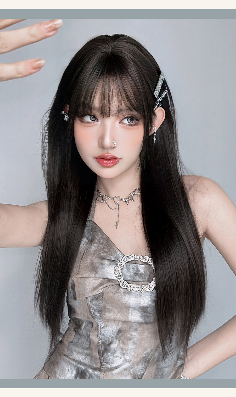 Long black straight wig with full black tea color, 73cm InTheMask by MOLIS hair extension on a mannequin head.