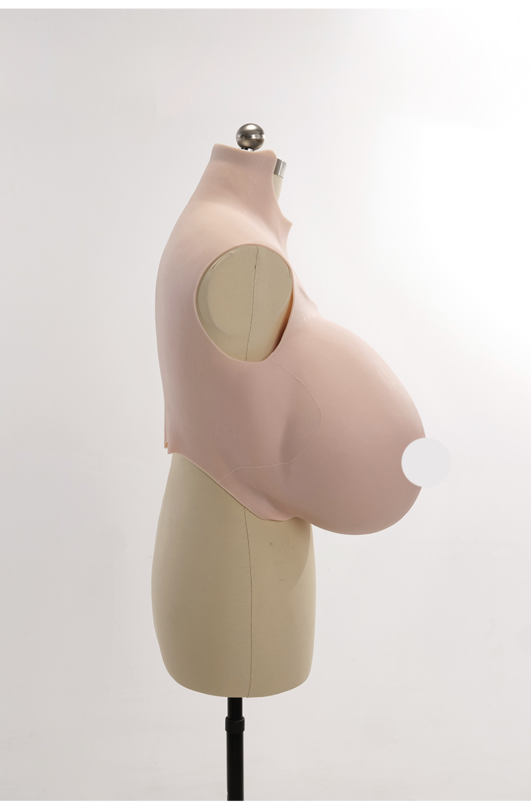 Silicone breastplate from InTheMask by MOLIS, labeled "X CUP," designed for breast expansion with a realistic appearance.