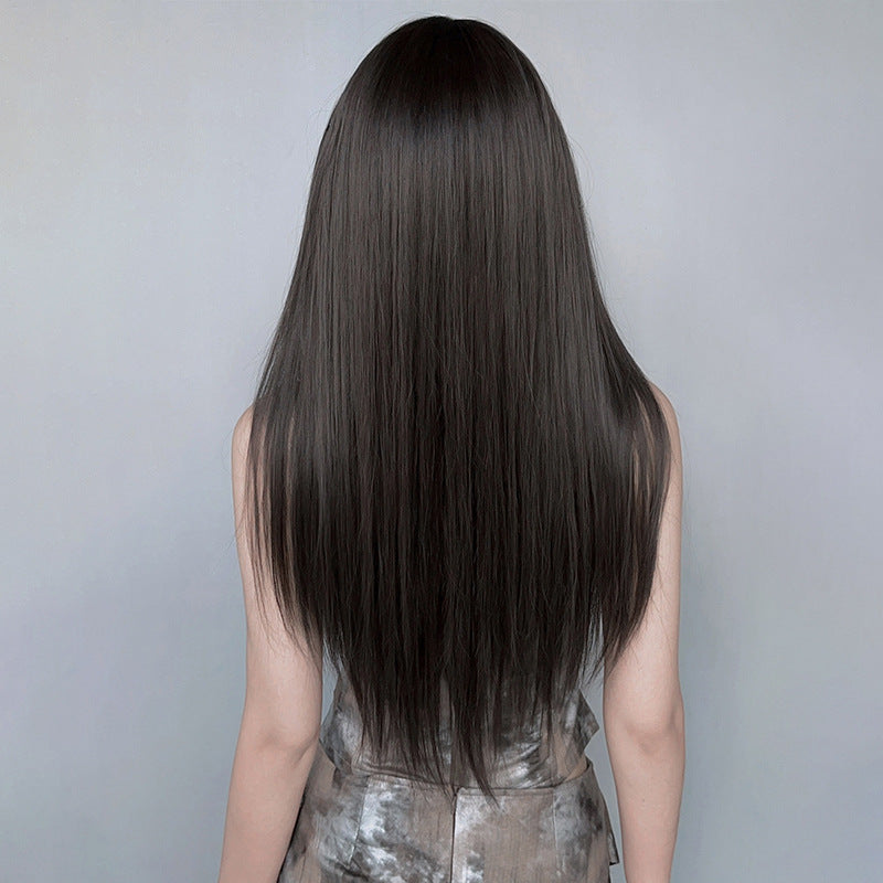Long straight black wig with full black tea color, 73cm from InTheMask by MOLIS, showcasing smooth, shiny hair with natural texture.