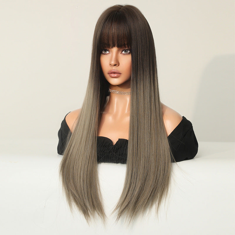 Long straight gradient color wig by InTheMask by MOLIS, showcasing sleek, extended hair with smooth texture and vibrant color transitions.