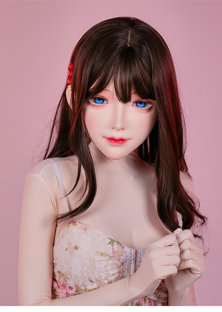 Black doll mask with "Muse" ear locks, featuring intricate details and dark makeup, designed by BlacKCat for InTheMask by MOLIS.