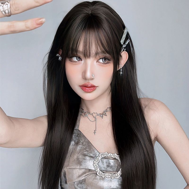 Long straight black wig with full black tea color, 73cm, by InTheMask by MOLIS, showing the sleek, shiny hair style.