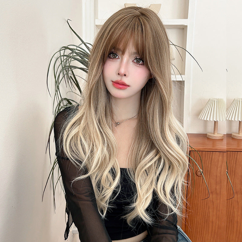 Long curly light brown flaxen wig from InTheMask by MOLIS, 67cm with a gradient color and natural textured hair.