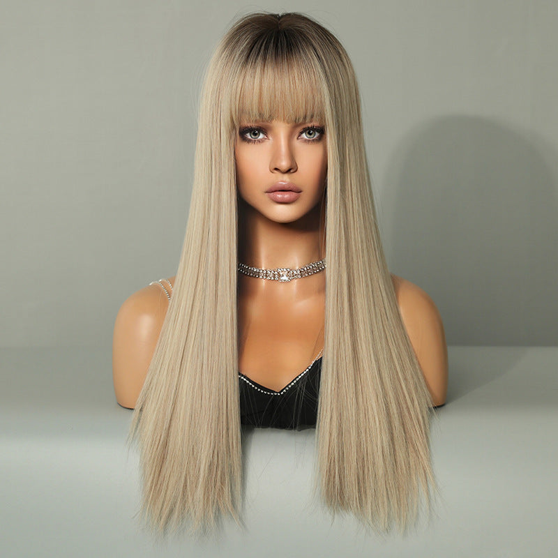 Long straight wig with gradient color from InTheMask by MOLIS, showcasing smooth, extended hair with a stylish ombre effect.