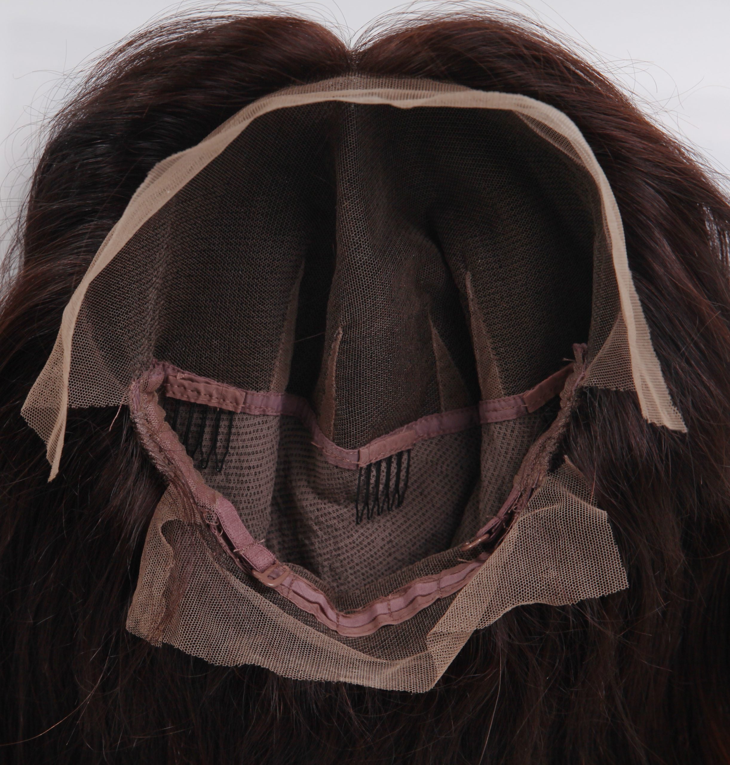 Genuine brown full lace wig with 16-22 inch brunette hair, by InTheMask by MOLIS, styled in natural waves.