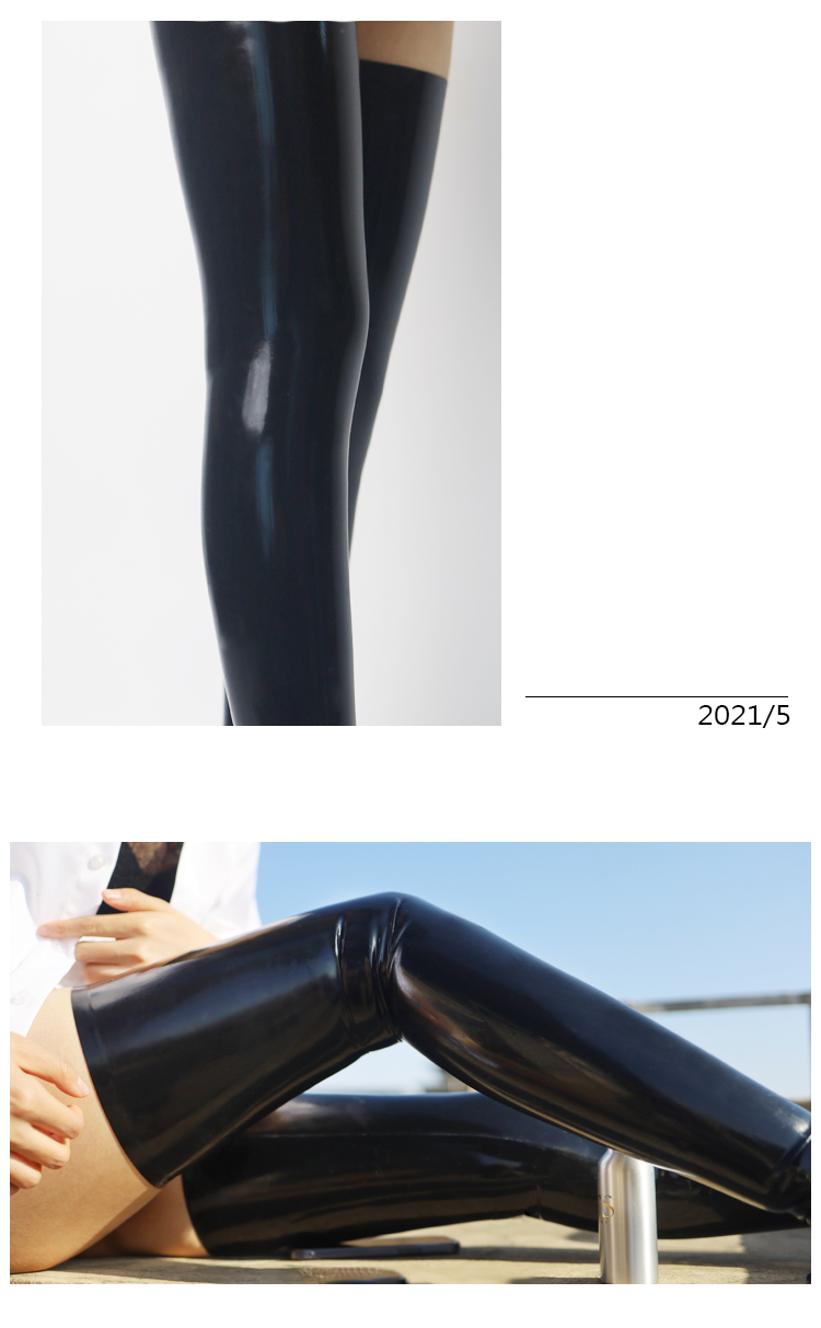 Black 100% custom latex stocking by NEOGAN from InTheMask by MOLIS, shown on a model with detailed fit and texture.