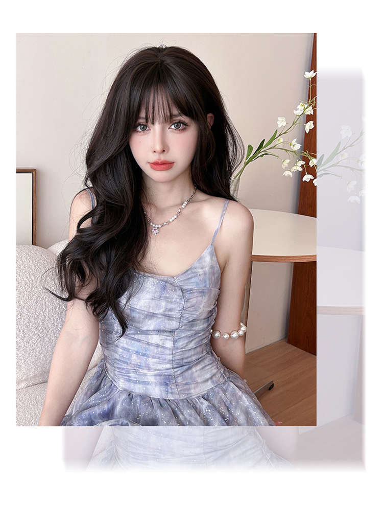 Long wavy black wig with airy flush bangs, 62cm, by Inthemask by Moli's, showing the flowing hair and stylish fringe.