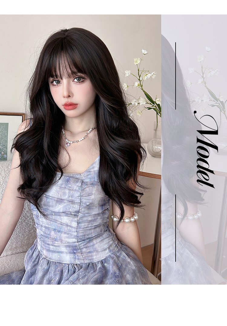 Long wavy black wig with airy flush bang by Inthemask by Moli's, 62cm, showcasing soft waves and natural volume.