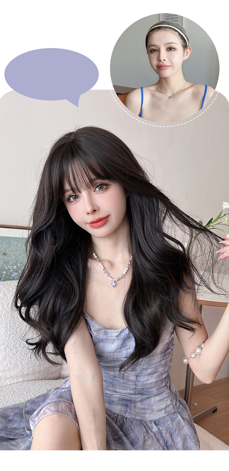 Long wavy black wig with airy flush bang, 62cm, by Inthemask by Moli's, showcasing flowing hair and stylish layered waves.