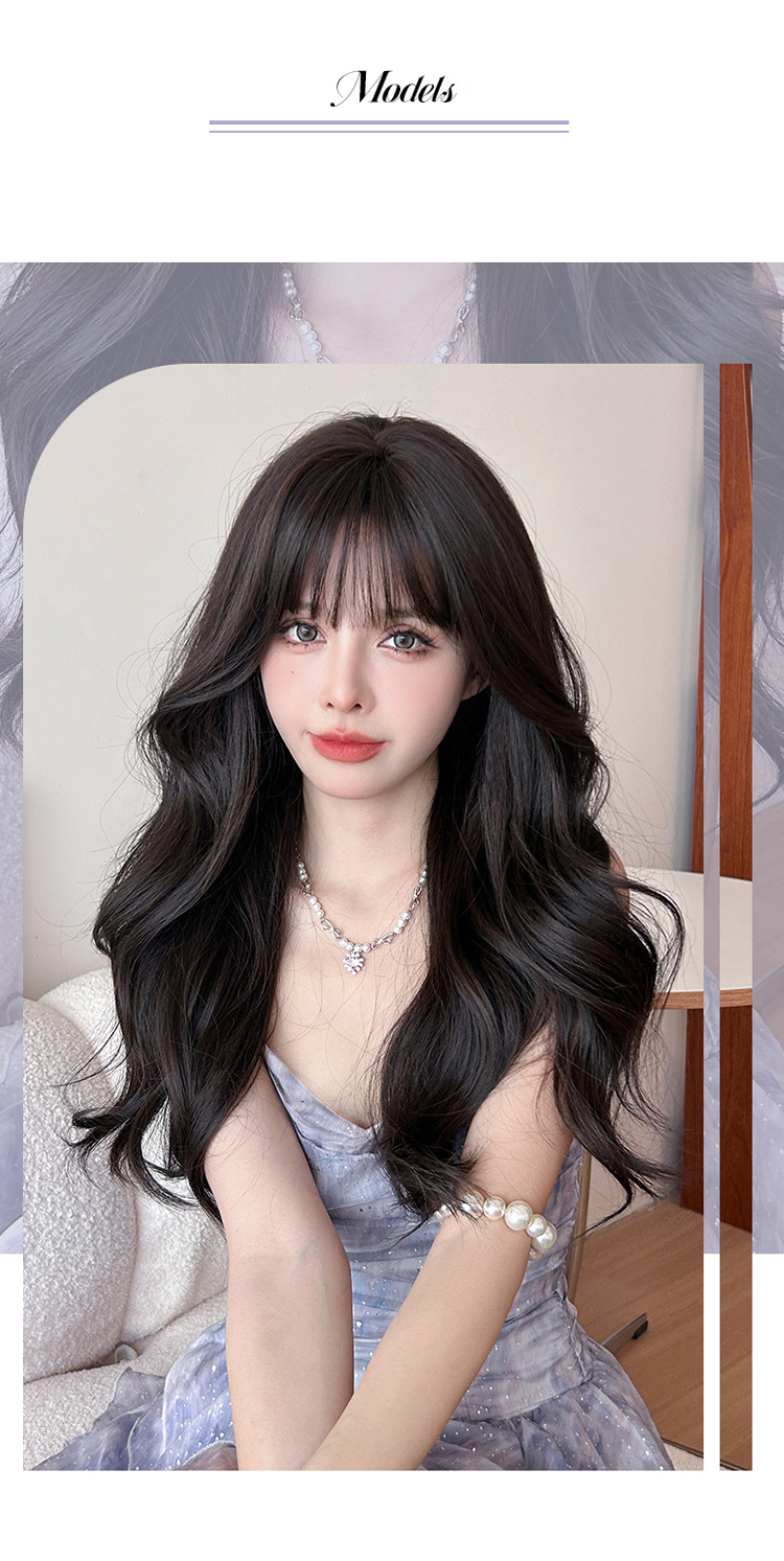 Long wavy black wig with airy flush bangs, 62cm, by Inthemask by Moli's, displayed on a mannequin head.