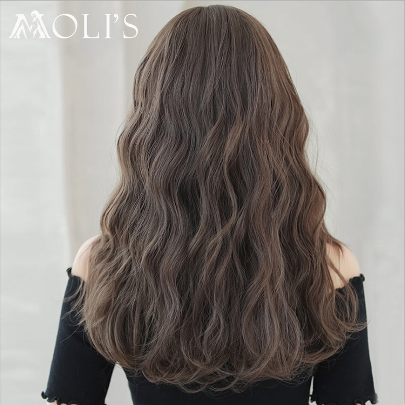 Brown 52cm straight wig with flush bangs by InTheMask by MOLIS, showcasing smooth, shiny hair with natural style.