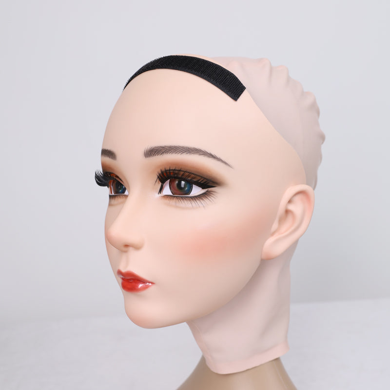 Pink latex gagged female doll mask by Molis D01T, part of InTheMask by MOLIS, featuring detailed facial features and adjustable fit.