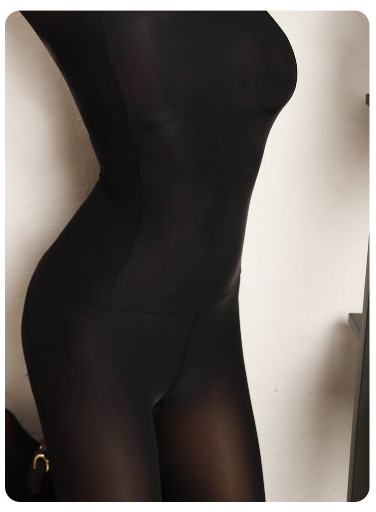 Black Molis Zentai suit from the TOUCH Series, form-fitting costume in nude-style black for versatile wear and accessories.