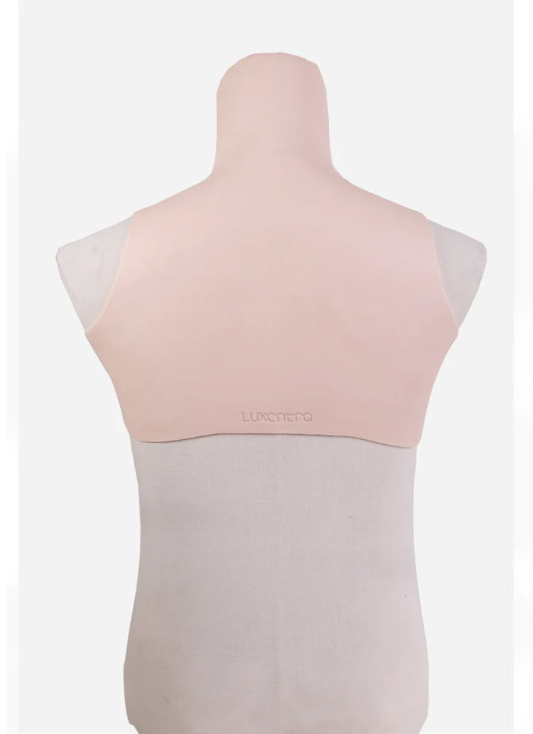 Silicone B cup breastplate by InTheMask for crossdressers, showing realistic contours and smooth skin tone.