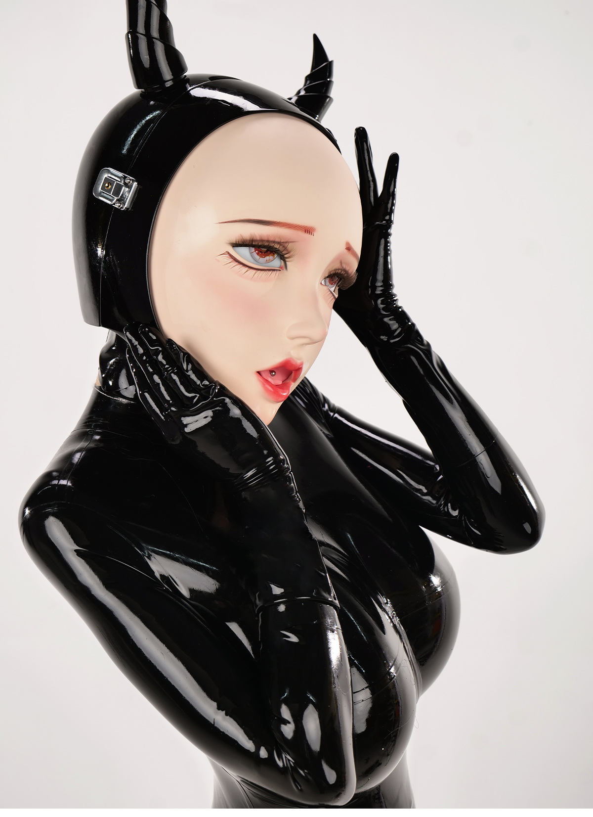 InTheMask by MOLIS Disguiser black mask with two ponytails and padlocks, featuring bold, theatrical design and detailed textures.