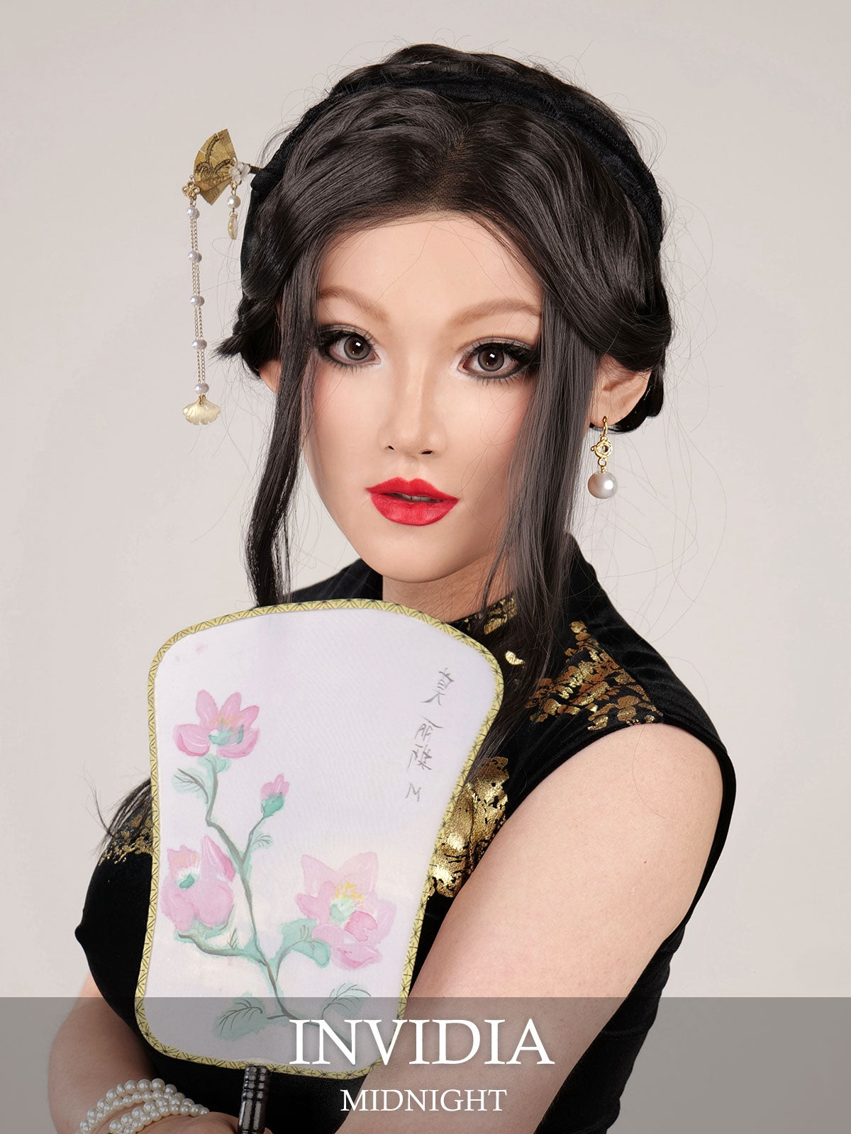 Midnight Invidia silicone female mask by InTheMask by MOLIS, featuring detailed facial features and smooth midnight finish.